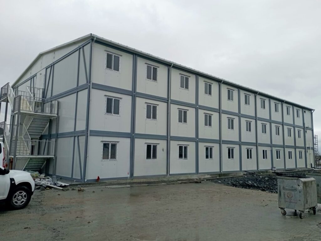 3-storey white construction container with stairs